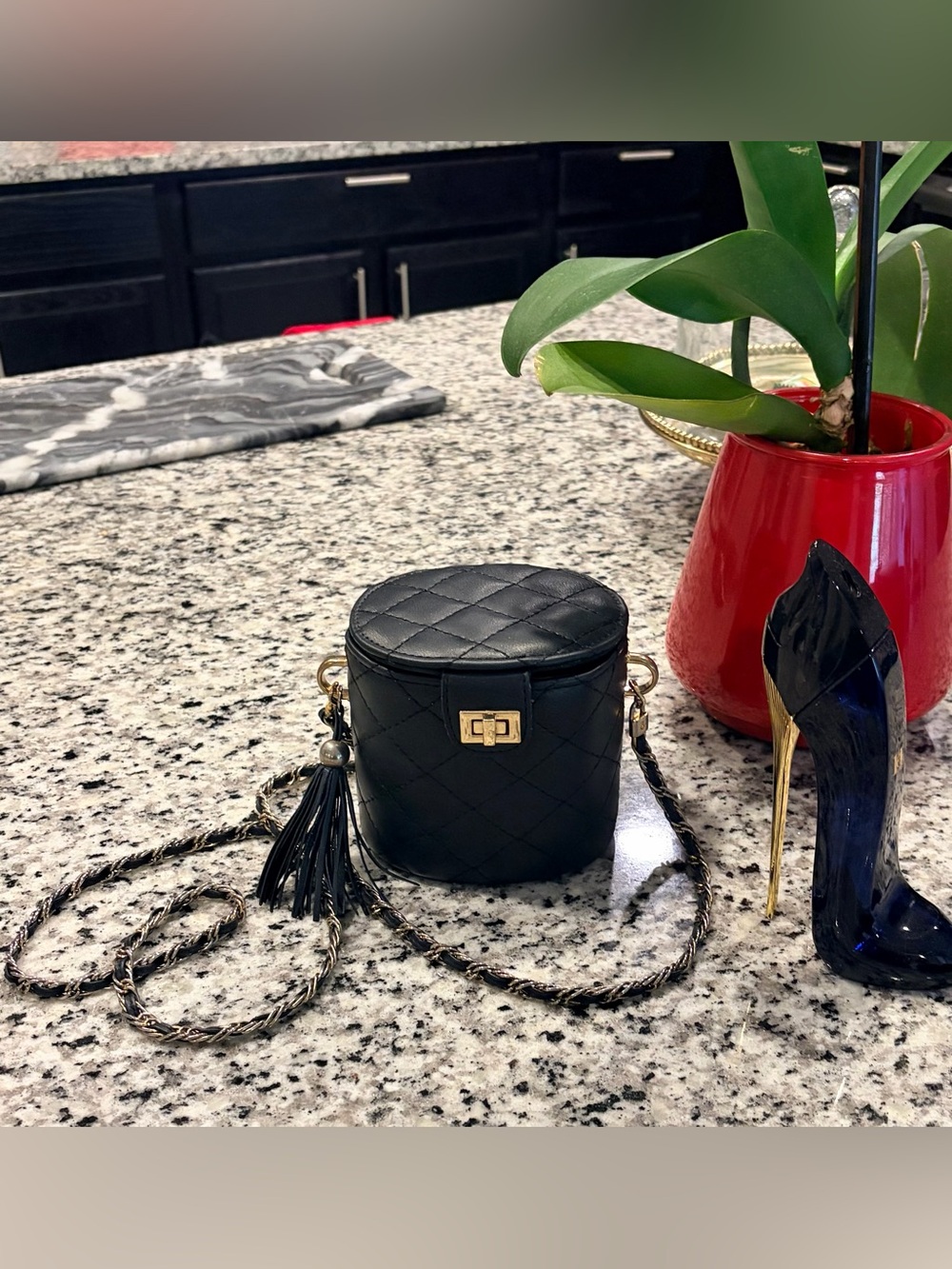 Black Quilted Leather Crossbody Bag with Tassel